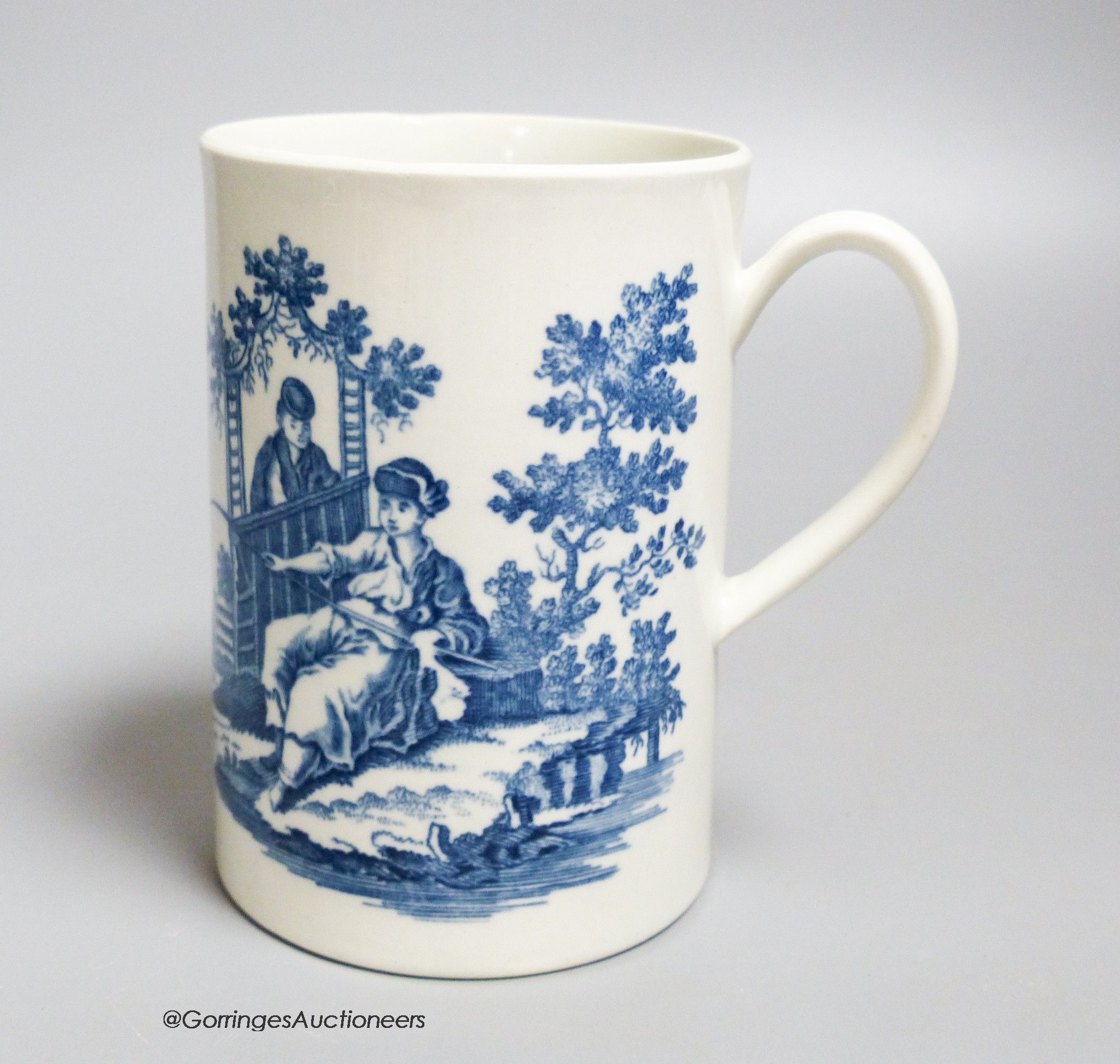 A Worcester 'La Peche and La Promenade Chinoise' pattern cylinder mug, printed in underglaze blue, shaded crescent mark, height 12cm